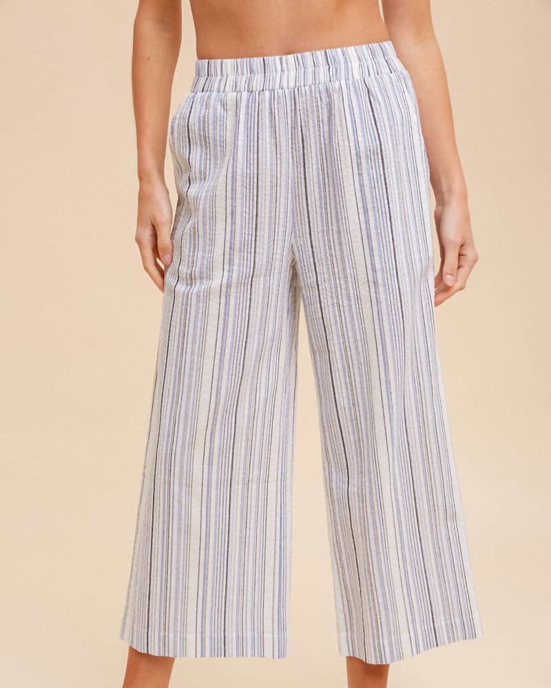 Front of a model wearing a size L Linen Stripe Wide Pants in Light Blue in Light Blue by Hem & Thread. | dia_product_style_image_id:339068
